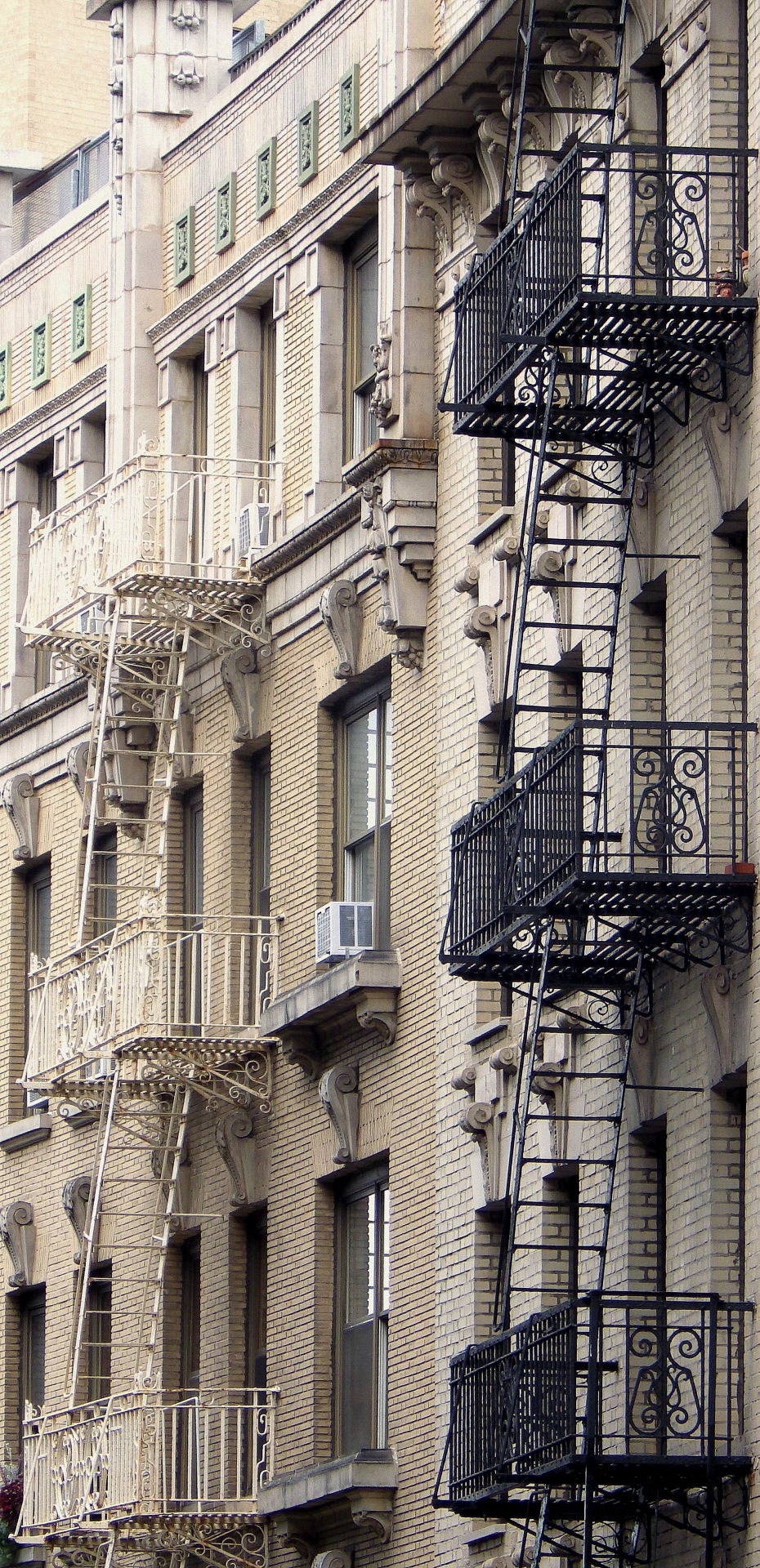 wanderingnewyork:
“ Fire escapes, brickwork and sculpture in Morningside Heights.
”