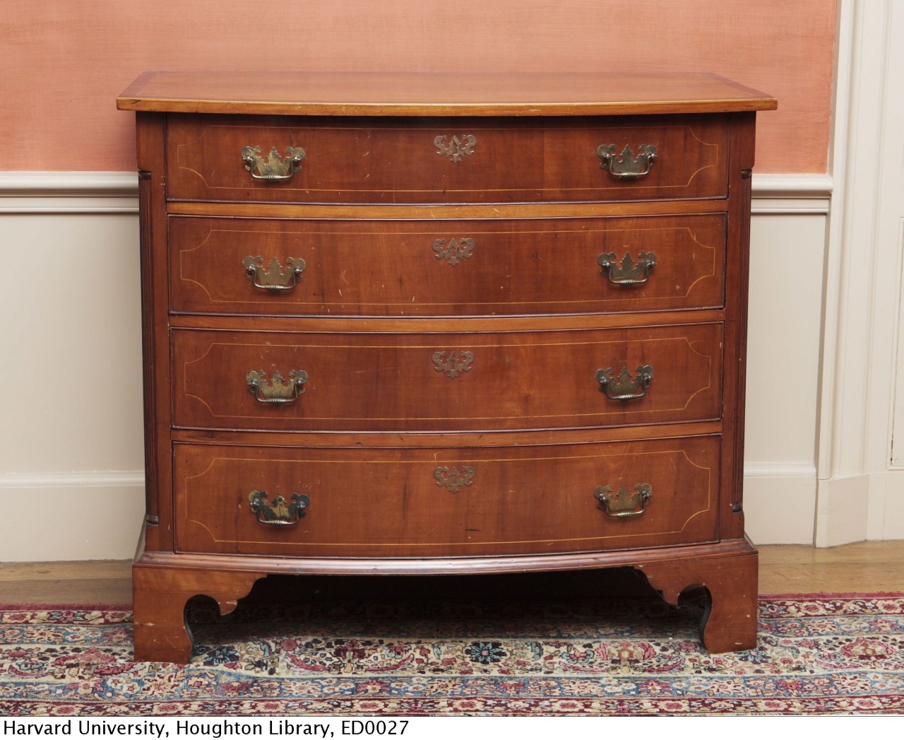 Bowfront chest of drawers. New England, unknown maker; circa 1785-1810.
The bottom drawer of this chest of drawers once held hundreds of Emily Dickinson’s poems. Her sister Lavinia discovered them there after Emily’s death. The chest was in the...