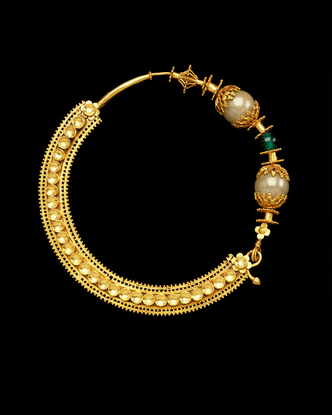 bhagyawati:
“Nose ring (nath)
Gujranwala, Pakistan
c. 1853
Gold with imitation gems
V&A Collection
”