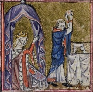 A crowned woman kneels as a priest says Mass.
The woman under the canopy is probably the first owner of the manuscript.
Fun fact: the cloth wrapped around her throat is a popular medieval head garment called a wimple.
From the Taymouth Hours,...