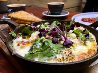 Eating toast (and shakshouka).