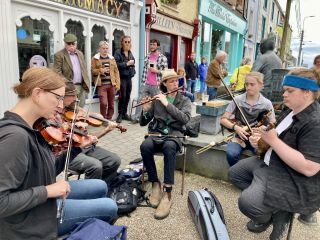 Playing tunes on the street.