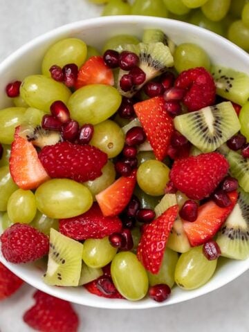 Bowl of red and green fruit salad