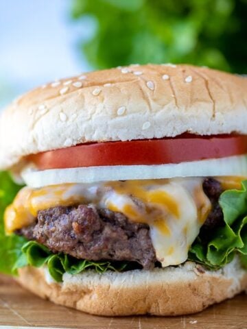 Assembled Burger on wooden cutting board