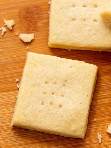 Baked Shortbread Cookies on wooden Cutting board.