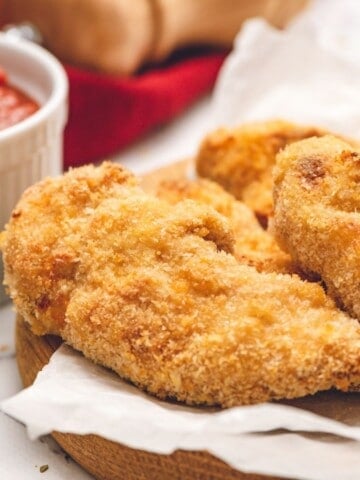 Homemade Chicken Tenders on platter.