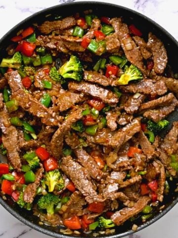 Saute pan with hunan beef.