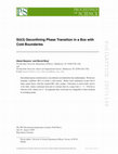 Research paper thumbnail of $SU(3)$ Deconfining phase transition in a box with cold boundaries