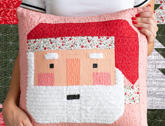 Make a festive Santa patchwork pillow with a fluffy Chenille-It beard. Learn Vanessa's tips & tricks to making one for yourself. Fabric is Berry & Pine by Lella Boutique for Moda Fabrics.