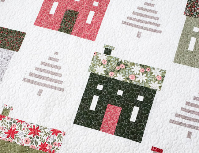 "Holiday House" Christmas neighborhood quilt with simple tree blocks. Fabric is Berry & Pine by Lella Boutique for Moda Fabrics. Download the PDF here!