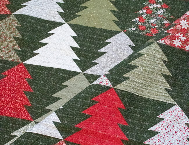 "Fir Tree Lane" geometric Christmas tree quilt. Make it with fat quarters or fat eighths. Fabric is Berry & Pine by Lella Boutique for Moda Fabrics. Download the PDF here!