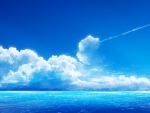 White clouds on blue horizon