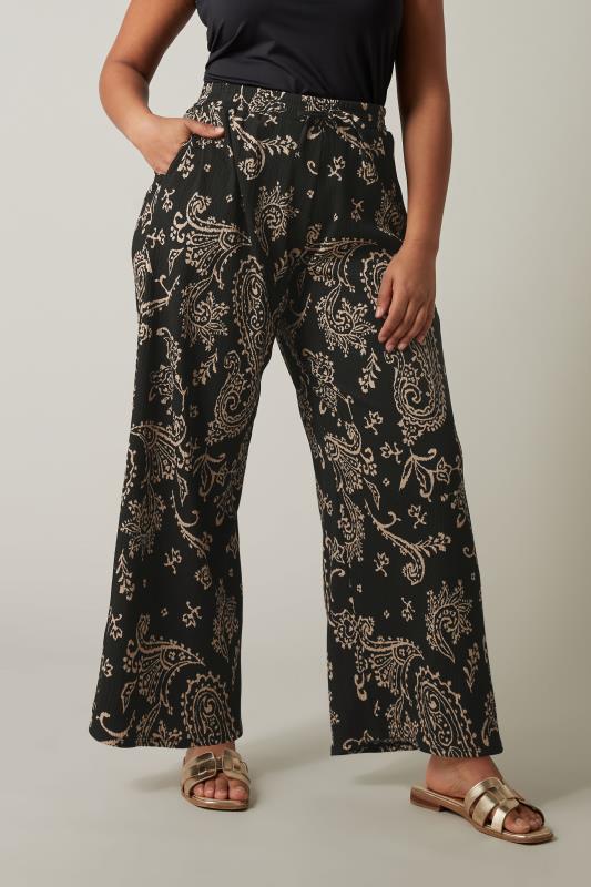 Plus Size  EVANS Curve Black Paisley Print Crepe Trousers