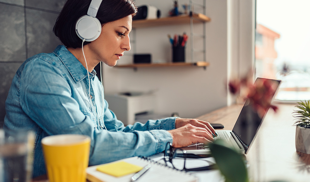 Author writing on laptop