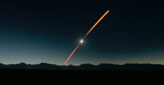 In this timelapse image of the Great South American Eclipse on July 2, the sun sets behind the Andes mountains as the moon crosses directly in front of it, creating a stunning "diamond ring" effect in the evening sky.