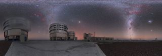 In this peculiar-looking panoramic shot of the Paranal Observatory in Chile, the Milky Way appears to form two tornado-shaped columns of starlight that extend down from the heavens to Earth's surface. This illusion is the result of the photographer, the European Southern Observatory's Petr Horálek, projecting an entire 360-degree panorama onto a flat, rectangular image. In reality, the Milky Way arcs across the sky from one horizon to the other; the fact that it appears to spread out across the top of this image is merely a product of the illusions. Also visible here are the Magellanic Clouds, the Pleiades star cluster, the bright planet Jupiter and several nebulas.