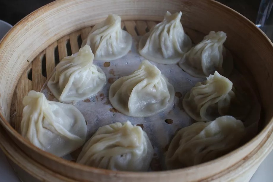 Dumplings in a wood steamer at Duck House