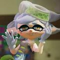 Marie waving in the Inkopolis News Studio