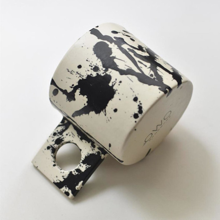 Handmade Modern Matte Black and White Splattered Ceramic Rock Mug by OWO Cerámica