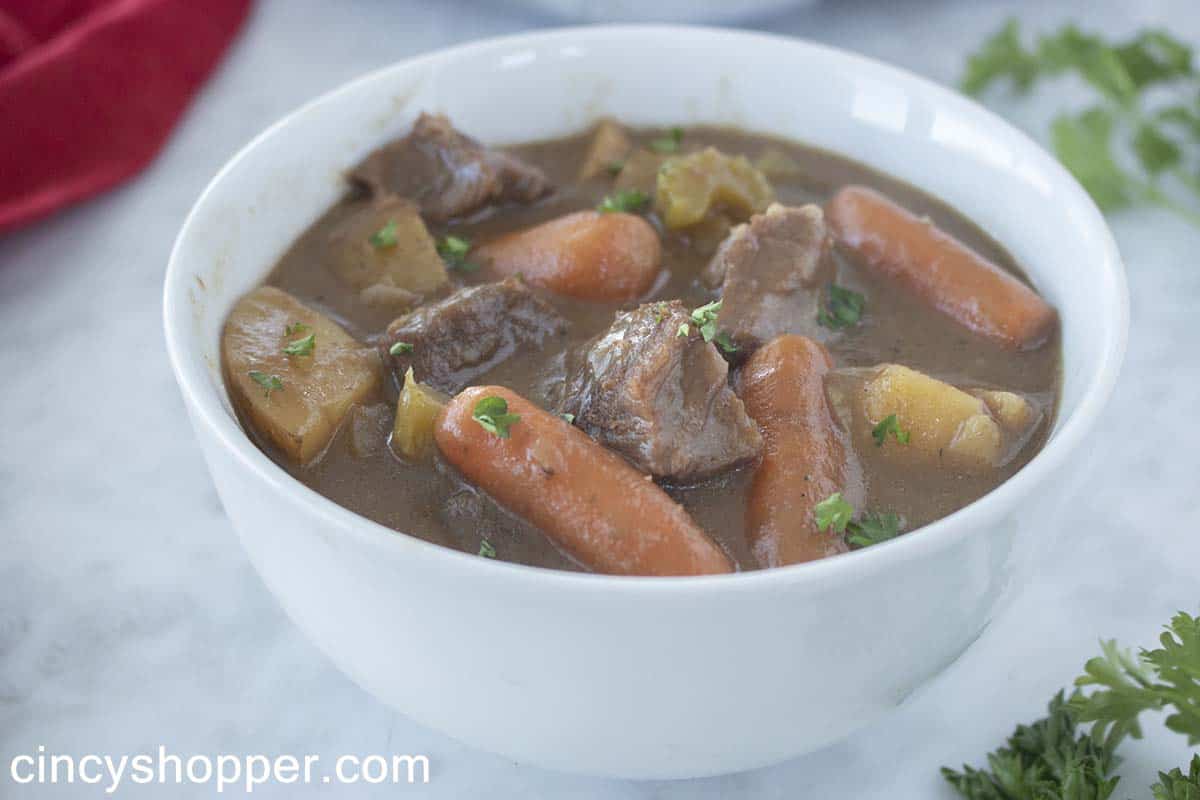 White bowl with brown gravy stew