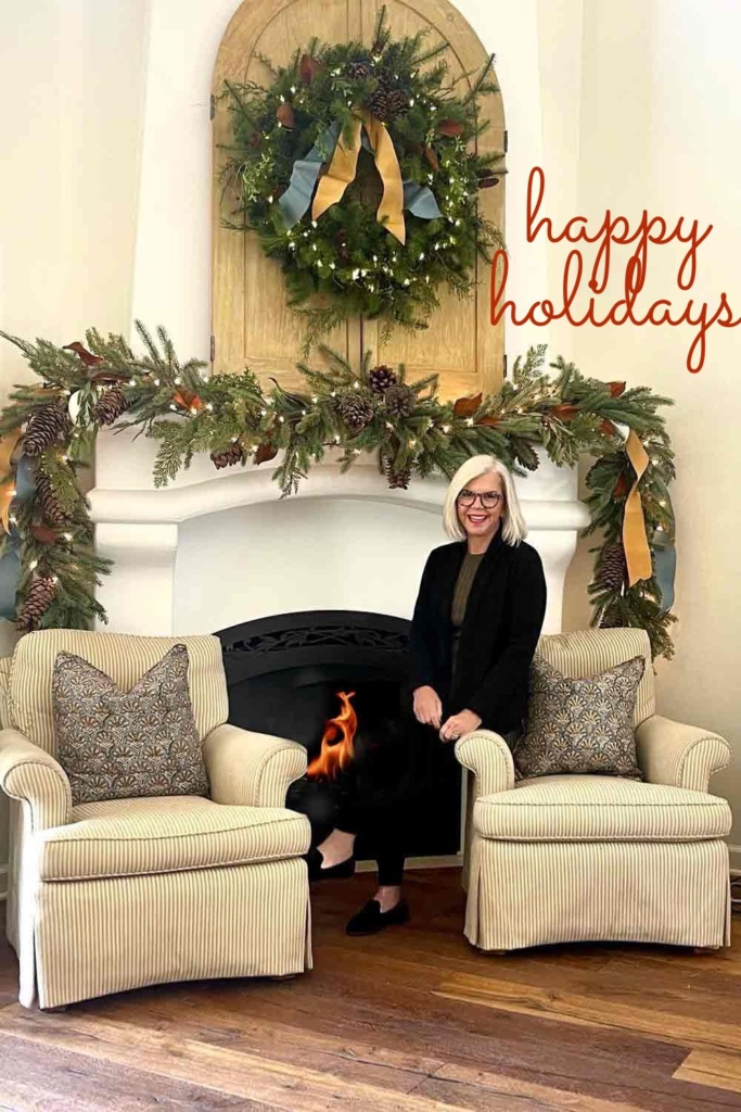 cindy hattersley in front of her fireplace