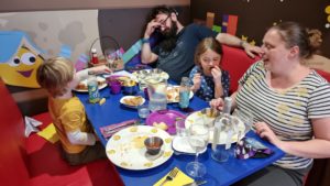 Ruth, JTA and the kids eat dinner.