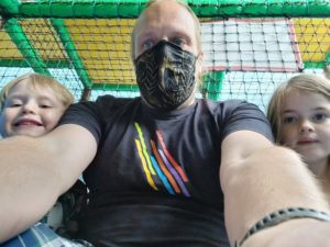 Dan and the kids on a racing slide.