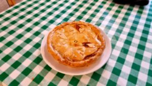 A butter pie with heart-shaped pastry decorations.