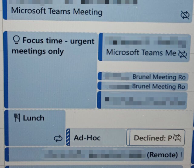 Digital calendar showing a 'focus time - urgent meetings only' block clashing with four other events.