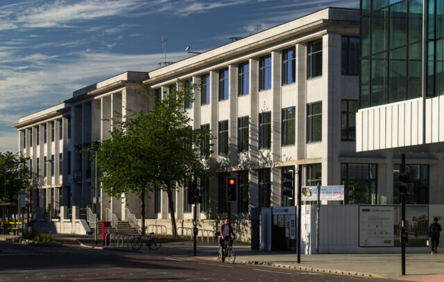 Three-storey building on a city street.