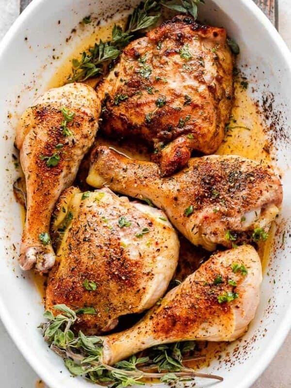 overhead shot of crispy baked chicken drumsticks and chicken thighs