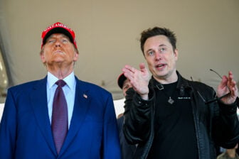 Image of Elon Musk watching rocket launch with Donald Trump.