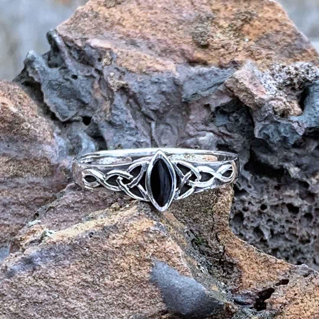 A petite Marquise Black Agate and Sterling Silver Ring with Celtic Knots on each side of the stone