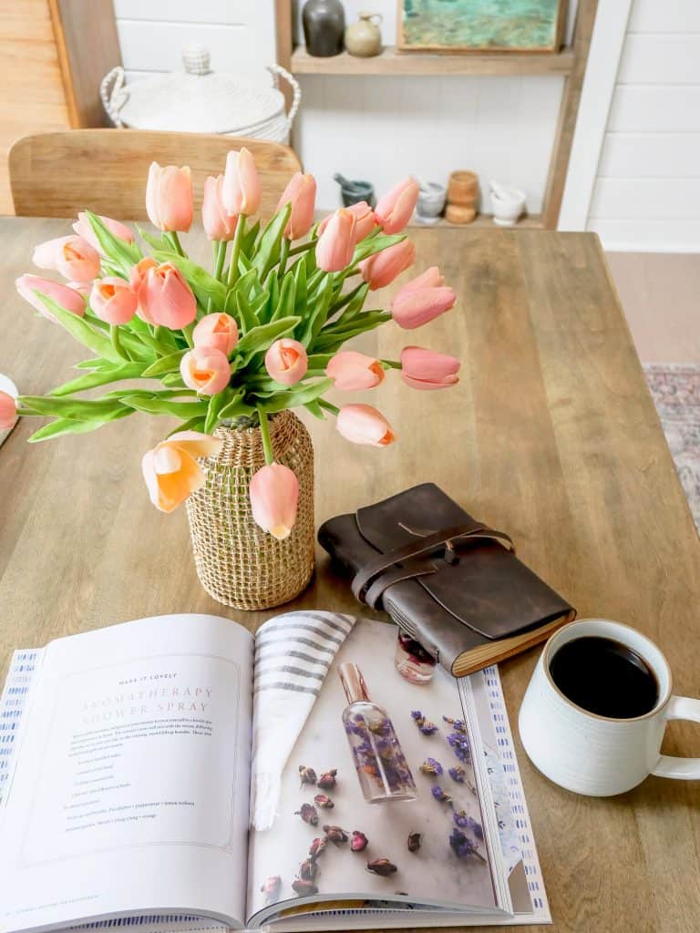 Journal and book on a table.