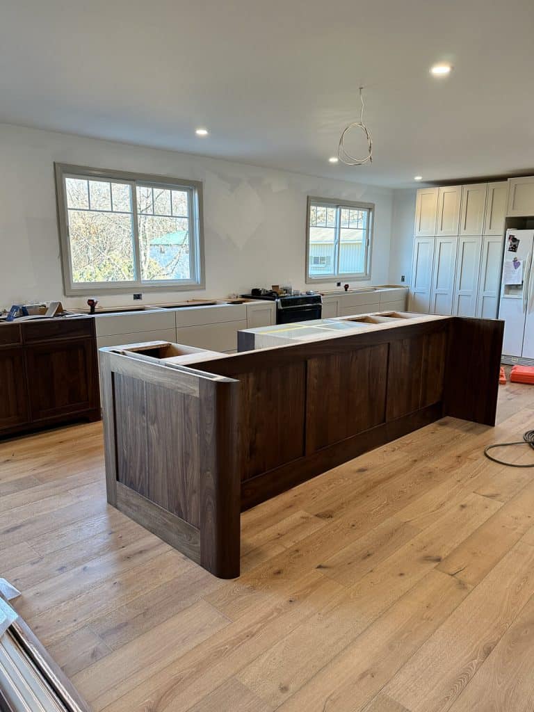 Kitchen island installed without countertop.