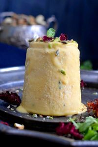 #Mango #MangoRecipes #Mangolicious  Made using mango puree, condensed milk, kesar, and full cream milk, Kesar Mango Kulfi is a delight for the taste buds. Check out its recipe and store Kesar Mango Kulfi to spend this summer in a breeze