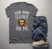 Men's Funny Thanksgiving T Shirt Pour Gravy On Me Turkey Graphic Tee Cute Shirts This funny Thanksgiving t shirt is perfect for the weeks leading up to Thanksgiving as well as for the big feast! It features a silly turkey face and reads 'Pour Some Gravy On Me'. It wouldn't be Thanksgiving without a little gravy! Machine wash and dry. Features a tear away tag for comfort and includes a drawstring cotton gift bag. Direct to garment printed using the latest technology. Soft, ring spun cotton. Custo