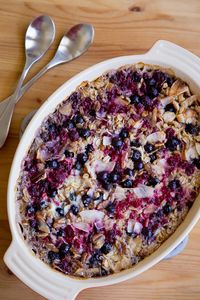 A huge dish of baked oatmeal with fresh berries, pecans, and coconut is a wonderfully delicious and healthy way to start your day.