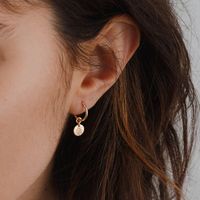 Throw some light on with our Sia Starburst Hoops. With removable disks, these hoops are double the style and double the warmth. Add ’em to your stack or style them alone for a look that’s wearable sunshine.