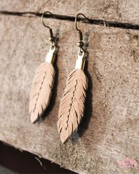 Leather feather earrings #leatherearrings