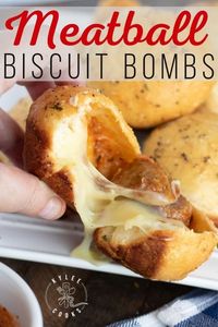 Just a few ingredients and these Meatball Bombs are ALL YOURS. Cooked meatballs are dipped in marinara, then encased (with cheese) in biscuit dough, brushed with flavorful garlic butter, and baked. #appetizer #meatball #gameday #kyleecooks