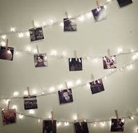 Hung below stage  way to display pictures at a party