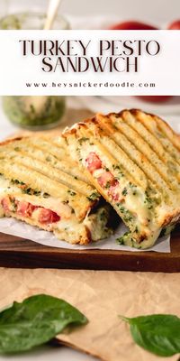 This turkey sandwich is loaded with pesto, melty fontina cheese, piled high with delicious slices of turkey and tomato and then grilled or toasted until it is a perfect golden brown. It has got tons of flavor and is a great lunch or dinner choice!