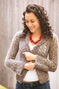 This open-front cardigan is a breeze to make. Boasting beautiful yarn and subtle vertical lines, this top is a great way to transition between seasons.