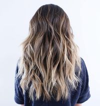 Long Choppy Hairstyle With Blonde Highlights