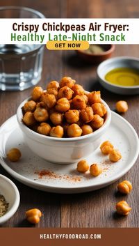 Satisfy your snack cravings with these crispy, seasoned chickpeas. A quick, healthy, and protein-packed treat perfect for any time of day!  📝 Ingredients:  400 g canned chickpeas, rinsed and drained 1 tbsp olive oil ¼ tsp onion powder ½ tsp garlic powder ¼ tsp sea salt ½ tsp paprika 👩‍🍳 How to Make: Preheat the air fryer to 200°C. Pat chickpeas dry with a paper towel. Toss them in a bowl with olive oil and spices, ensuring even coating. Air fry for 15 minutes, shaking every 5 minutes until golden and crispy. Let cool completely before storing in an airtight container for up to a week.  Click the link for tips and seasoning variations!  #CrispyChickpeas #AirFryerSnacks #HealthyLateNightSnacks #ProteinSnack #QuickAndEasy #HealthyEats