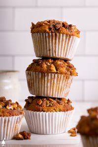 These spiced, aromatic keto pumpkin muffins are petite, portable, and absolutely perfect as a snack or on-the-go breakfast. #ketopumpkinmuffins #lowcarbpumpkinmuffins