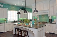 Stylish interior with turquoise accents by Highland Homes. I love this kitchen!