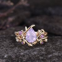 Item description ✦ Handmade, high-quality item! ✦ Material: 925 sterling silver, Solid 10k/14K/18K GOLD (can be made in white/rose/yellow gold) Engagement ring ✦ Center stone: Natural Lavender Amethyst. ✦ Size/Weight: 6x8mm Pear Cut ✦ Side stones: Marquise Cut Natural Amethyst and Round Cut Moissanites. Wedding band ✦ Gemstones: Round Cut Natural Amethyst and Marquise Cut/Round Cut Moissanites. Any ring size can be made,if the ring size is not in the option list ,contact me. As it is handmade,it