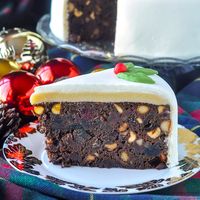 Ultimate Nut Fruitcake - using 5 different delicious nuts including almonds, hazelnuts, macadamia nuts, walnuts & pecan, topped by an almond marzipan layer.